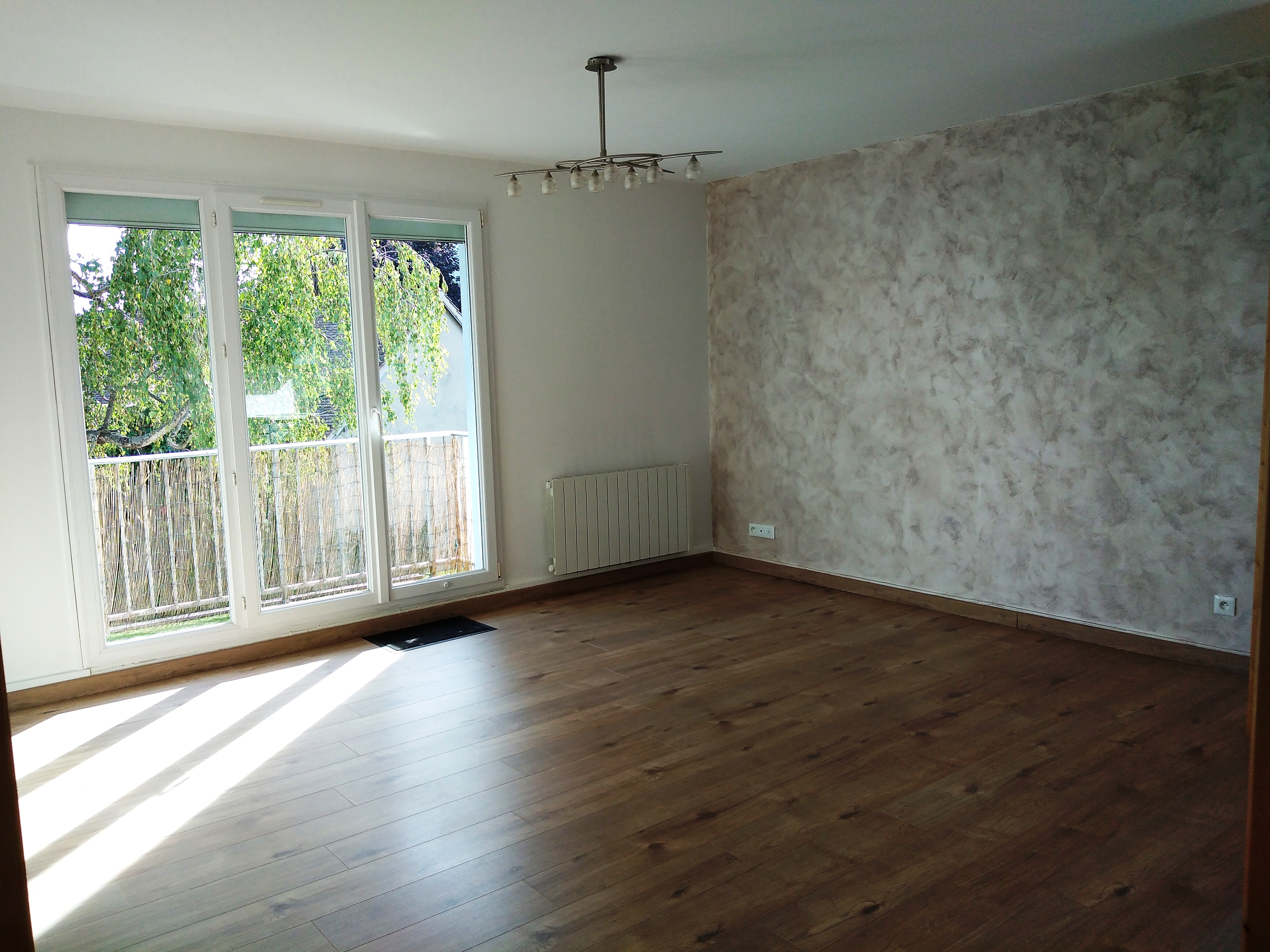 Appartement T3 de 60m² avec balcon, cave, place de parking 